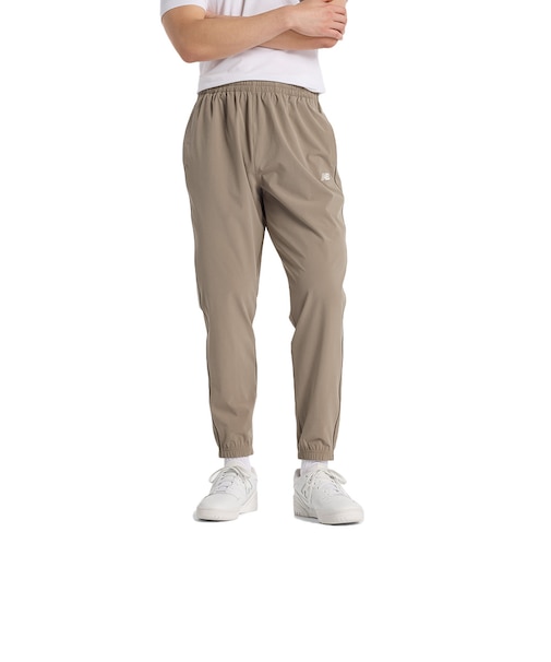 ニューバランス（new balance）ウーブントラックスジョガーパンツ AMP51205DOK