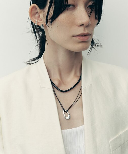 SMELLY so’ oval plate cord necklace
