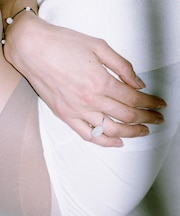 SMELLY so’ oval white jade ring
