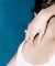 SMELLY so’　oval white jade ring