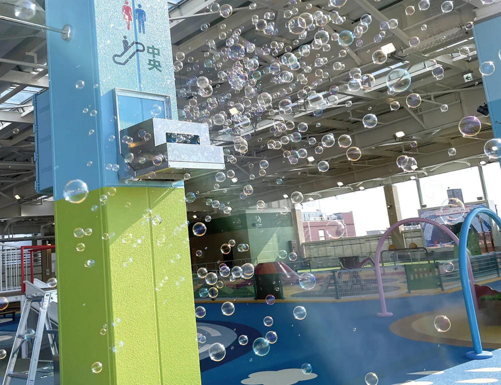 A shower of soap bubbles fills the entire space.