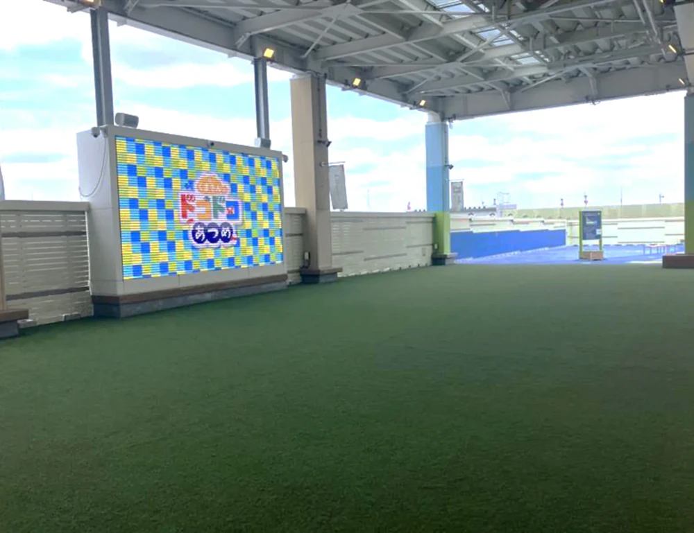 Large digital signage and rest area under the large roof