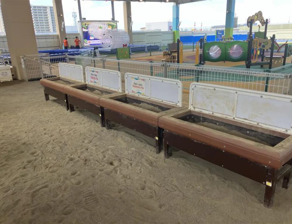 Covered sandboxes divided into corners