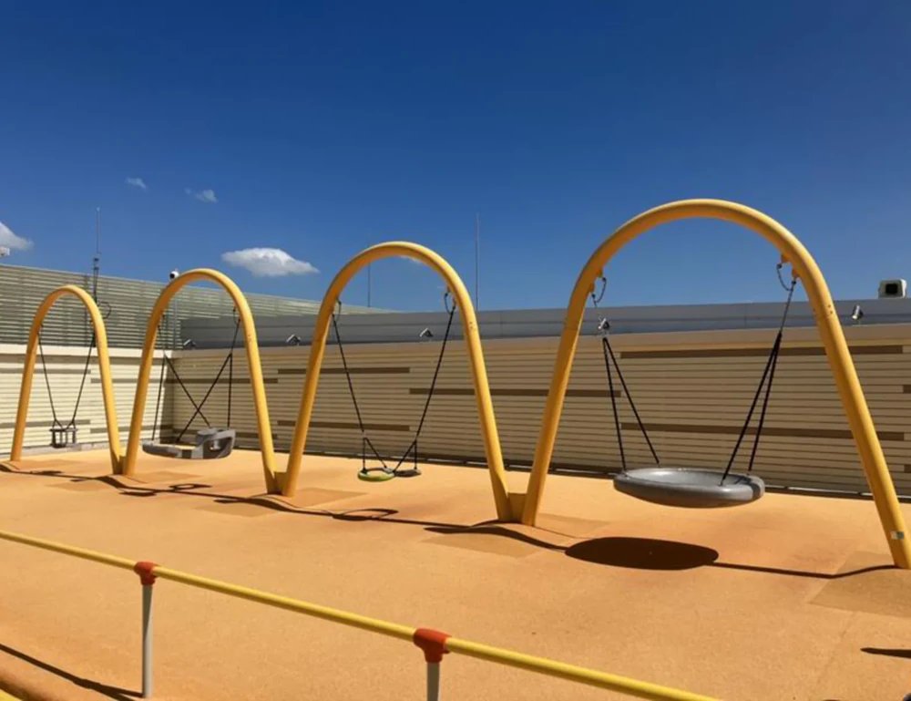 Yellow four-swing set